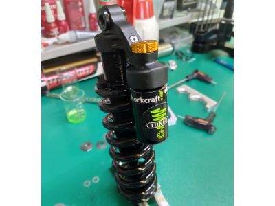 Rear shock service cost 2025